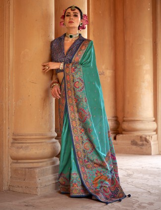 Blue silk saree with prints and unstitched blouse