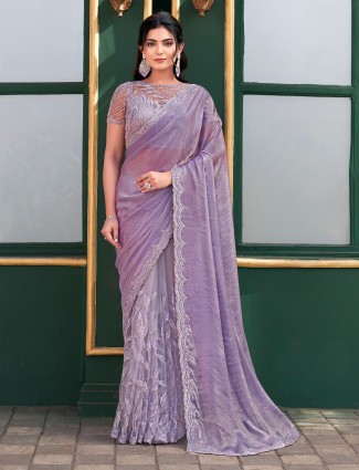 Purple soft net saree with cutdana bead work