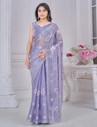 Purple organza saree with decorative festive touch