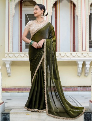 Embroidered dark green satin silk saree for celebrations