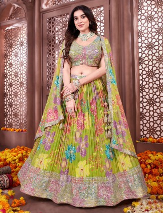 Green silk wedding lehenga choli with embellished dupatta