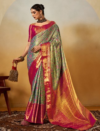Verdant silk drape adorned in zari detailing