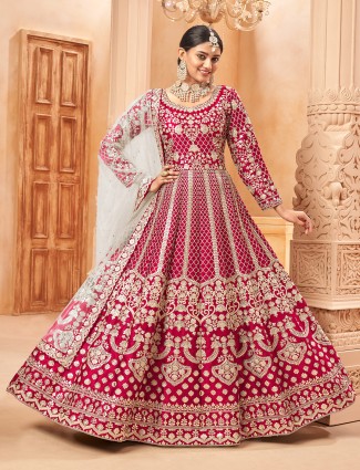 Festive pink silk anarkali suit with zari design