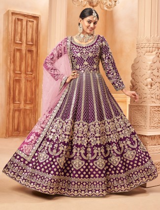 Purple silk anarkali suit featuring traditional zari embellishment