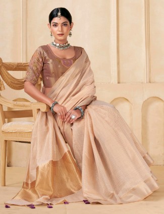 Beige viscose saree with festive appeal