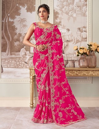 Pink organza saree with delicate embellishments