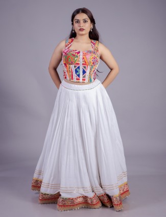 Festive white lehenga choli with zari accents