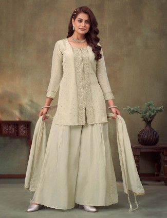 Cream embellished silk palazzo suit for festive wear