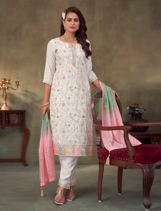 White silk suit with embroidery and dupatta