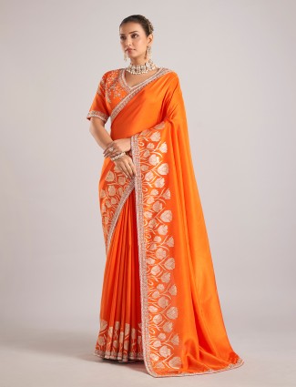 Orange pure dola silk saree with festive detailing