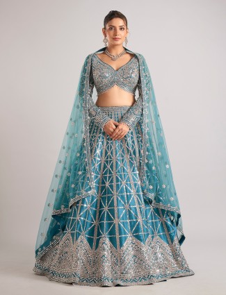 Rama green lehenga choli with mirror detailing in raw silk