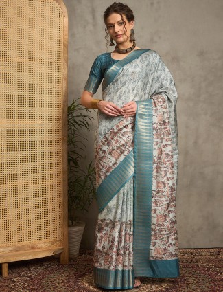 Teal blue silk saree with unstitched blouse