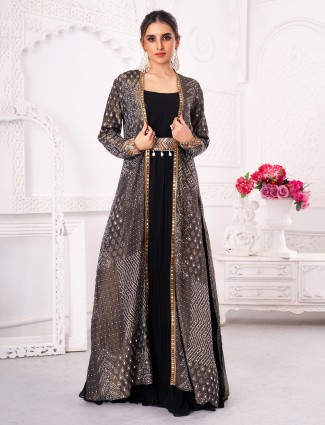 Black silk anarkali jacket style set with cowrie shell embellishments