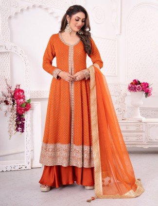 Orange pakistani georgette palazzo set with rich embroidery