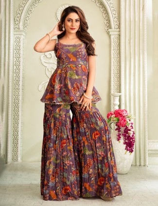 Pastel purple silk sharara set enhanced with stone and mirror work