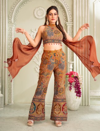Rust brown silk palazzo suit highlighted with resham detailing