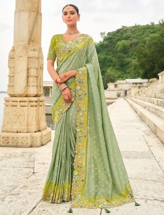Grey tissue silk saree with regal embellishments