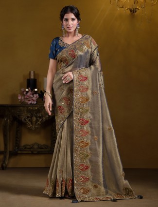 Pastel teal blue georgette saree with elegant embroidery