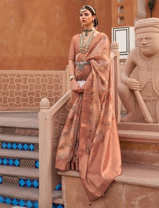 Peach organza saree with festive elegance