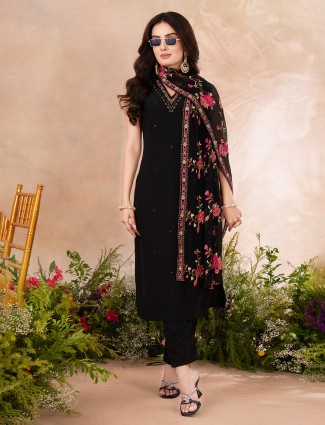 Black silk salwar suit paired with embroidered dupatta