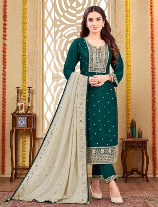 Deep green silk salwar set ideal for celebration wear