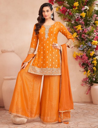 Orange silk palazzo dress adorned with sequins detailing