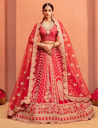 Pink raw silk bridal lehenga with luxe festive detailing