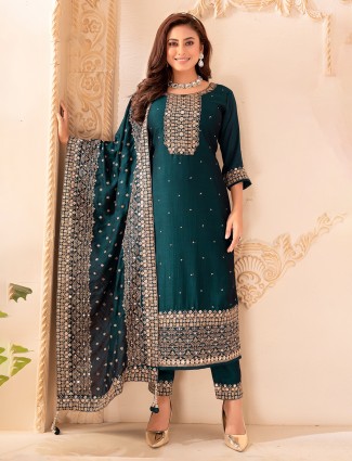 Rama green silk salwar attire with embellished work