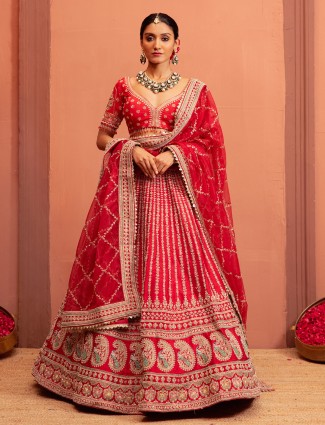 Red bridal lehenga choli with embroidered blouse