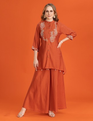 Brown silk sharara set with cowrie and beads details