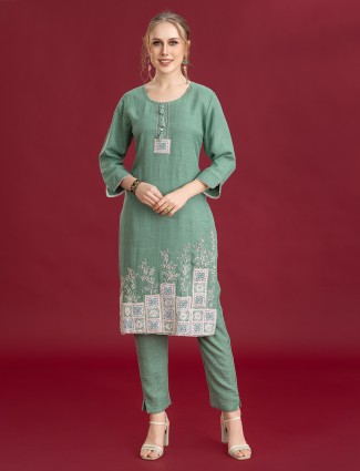 Green silk pant kurti set with round neck embellishment