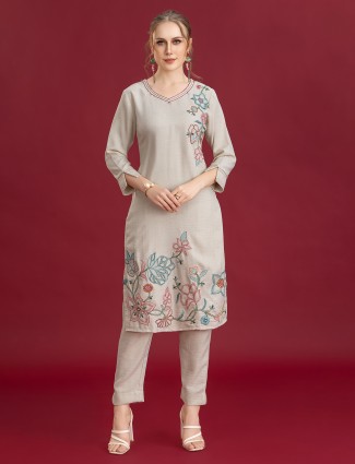 Light grey silk pant set with embroidered stone details