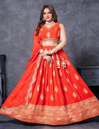 Classic orange bridal lehenga in lustrous silk