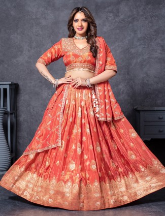 Glam orange silk lehenga glimmering with sequins