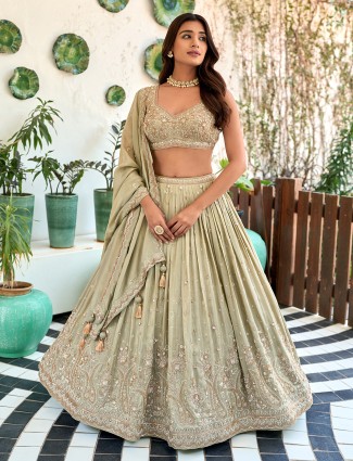 Wedding wear pista green silk lehenga choli