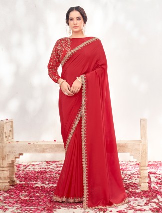 Red satin silk saree with stones zari embellishment