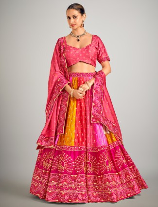 Rani color bandhej print silk lehenga choli with beads embellishment