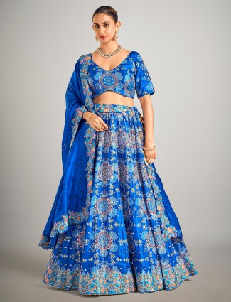 Teal blue printed silk lehenga choli with sequins embellishment