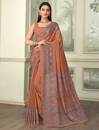Brown printed crepe saree for casual gathering