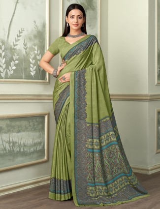 Pista green crepe saree with interisting prints