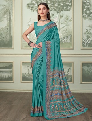 Printed aqua crepe saree for casual gathering