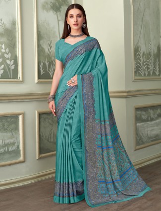 Turquise blue casual wear crepe saree with unstitched blouse