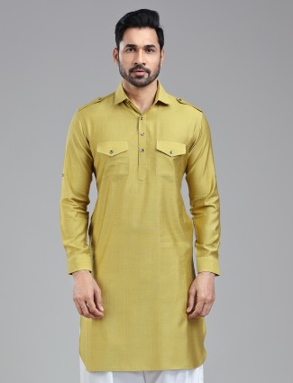 Radiant golden pathani kurta for a bold style