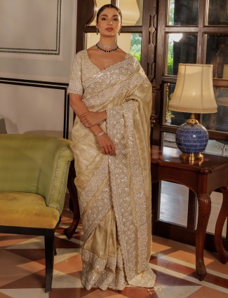 Beige silk saree in sequins work for wedding