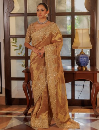 Gold silk saree with rich sequins work