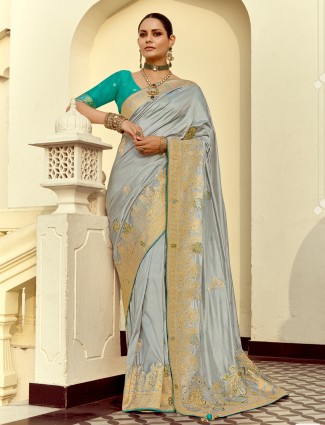 Grey silk saree with exquisite cutdana work