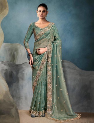 Mint green tissue silk saree for festive events