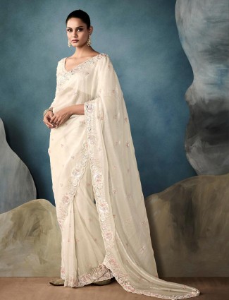 Elegant off white tissue silk saree
