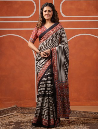 Black muslin saree with printed design and blouse