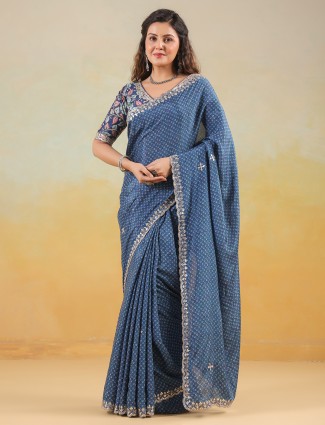 Blue muslin saree with printed design and blouse